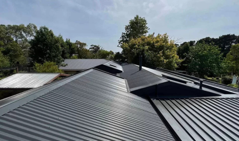 How can checking metal roof parts for rust help prevent bigger issues later