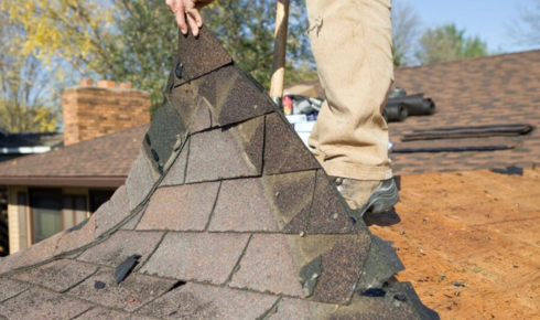 Why should you be cautious if you see repeated patch repairs in the same roof area